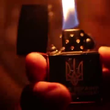 Ukrainian recruits who are training in the UK are given a lighter engraved with "Glory to Ukraine