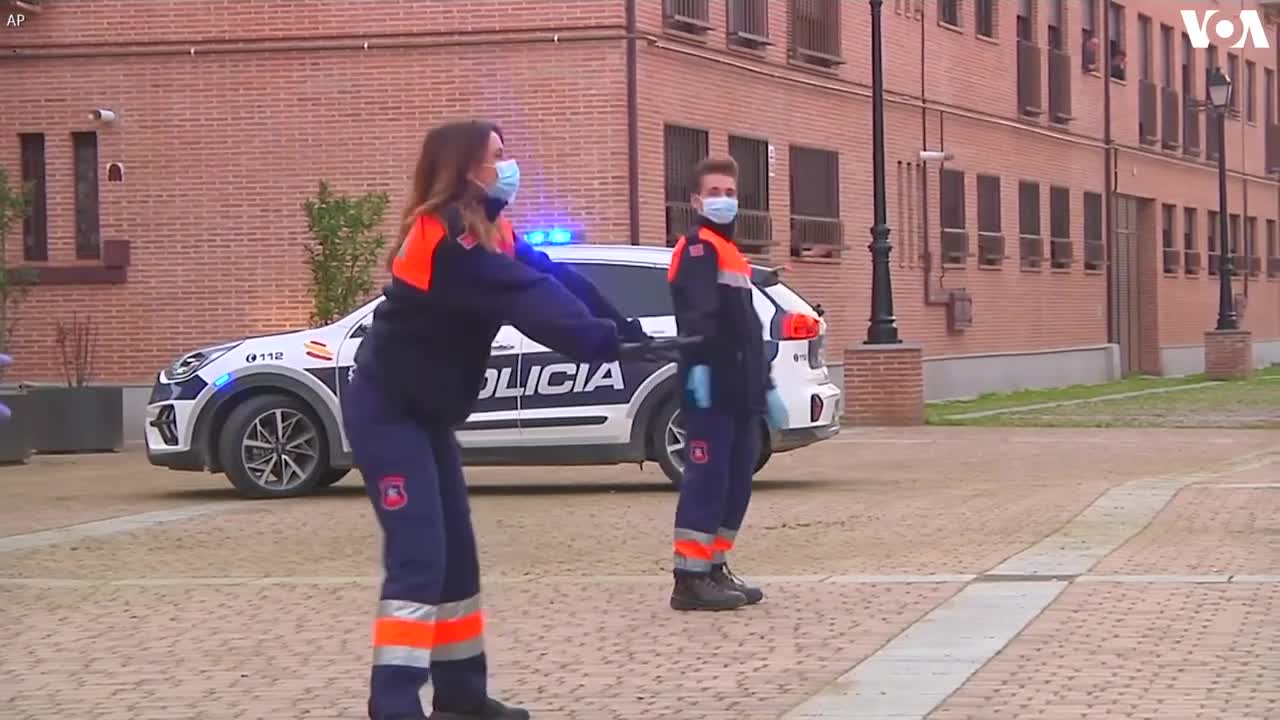 Spanish Volunteers Try to Cheer Up Residents in Town Outside Madrid