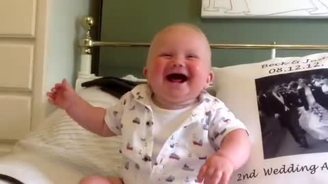 Baby laughing and chuckling