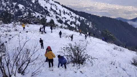 People enjoying snow