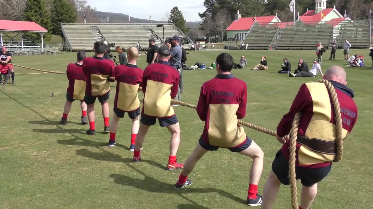 World's Strongest Men in a Tug o' War Challenge at Braemar Gathering Highland Games site in Scotland