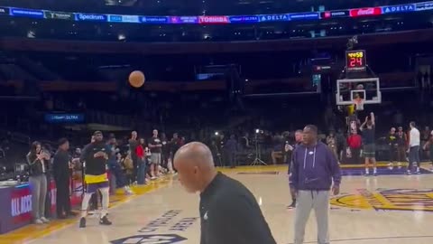 LeBron finishing up his warmup routine with some logo 3s and free throws: