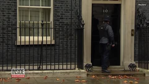 Cop Knocks on British Prime Minister's Door to Let Cat in Out of the Rain 