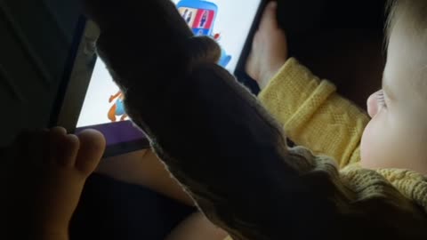 Baby Uses Her Feet as an iPad Stand