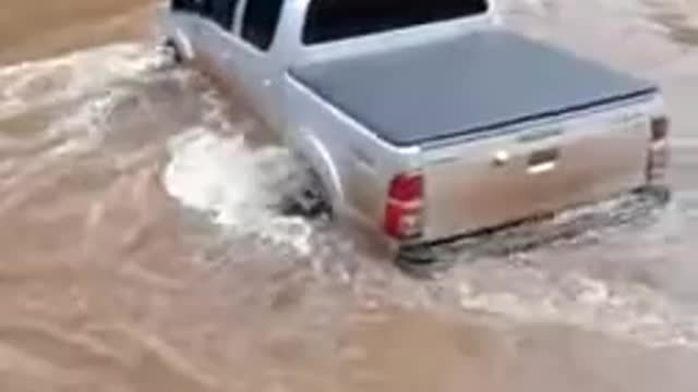 Swimming on the river by car