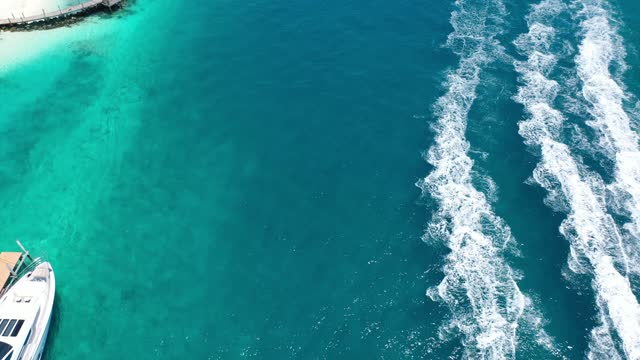 motor boats splash racing sea