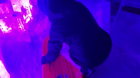 Jen down the ice slide