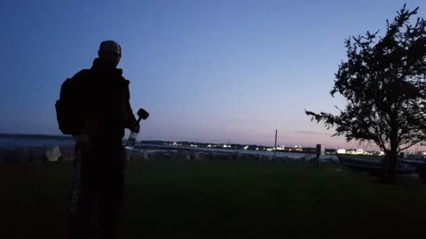 Walking away from the camer shot. After sunset. See ya