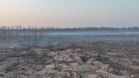 Drone footage of the aftermath of a battle for a trench network