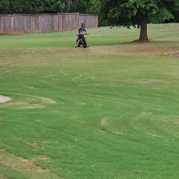 My boy riding his electric bicycle for the first time