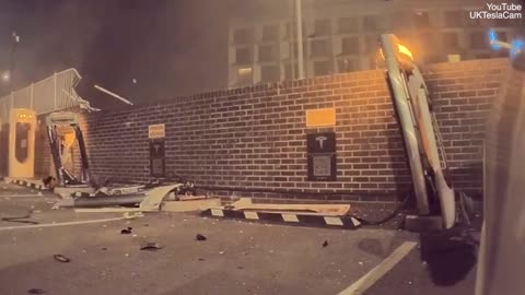 Car flies through Tesla garage barriers towards Park Royal station