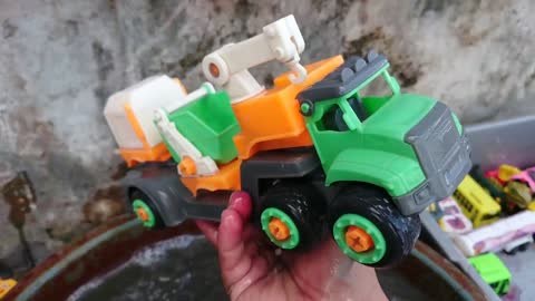 Clean up toy cars fire trucks, race cars, garbage trucks, tanker trucks, slenders, cranes, tayo