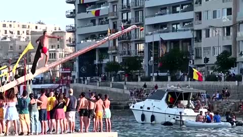 Maltese test their skill on a greasy pole