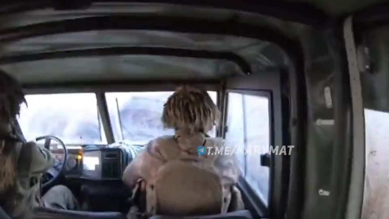 A Ukrainian vehicle was hit by an FPV drone - Seen from inside the vehicle