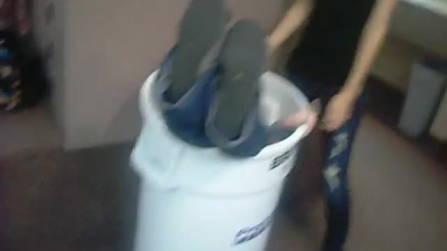 Girl get into dustbin . Very funny clip.