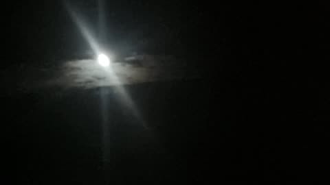 The Moon And Clouds Above Great Britain At Night