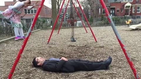 Awesome dad perfects swing stunt at the park