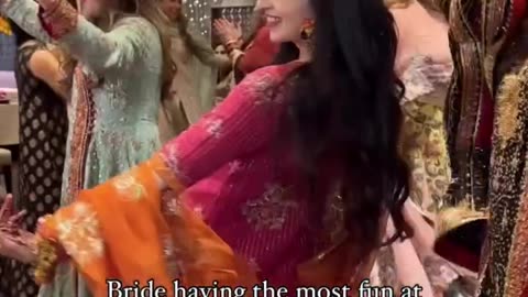 Bride having the most fun at her own dholki