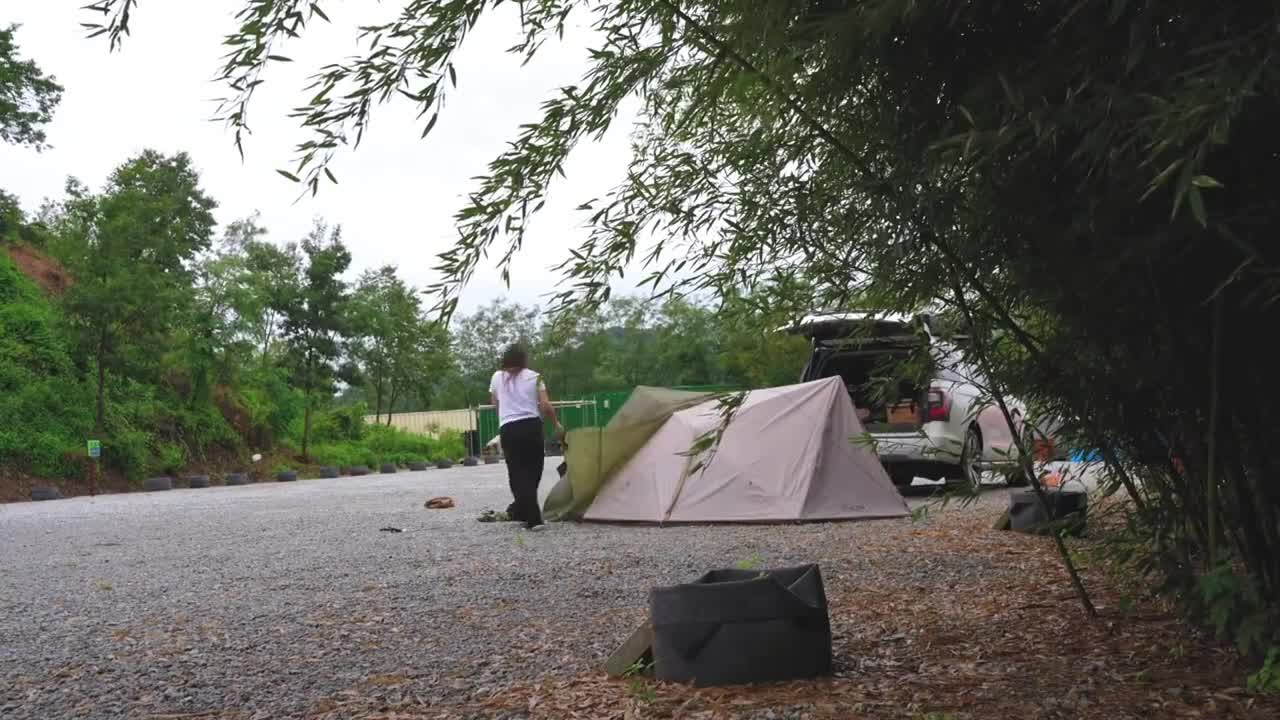 One person camping in the rain, enjoy the quiet of one person