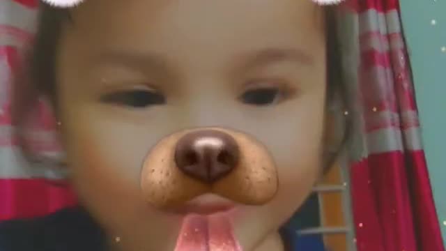 Cute little girl acting like a puppy