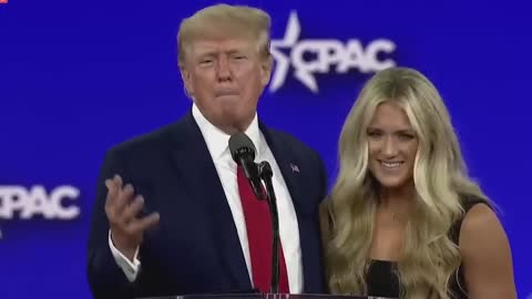 Watch moment Trump welcomes anti-trans swimmer onstage at CPAC