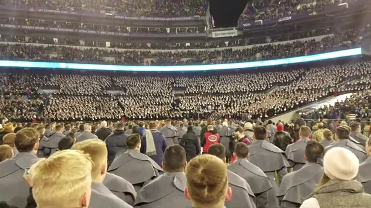 Army cadets rush field after victory over Navy