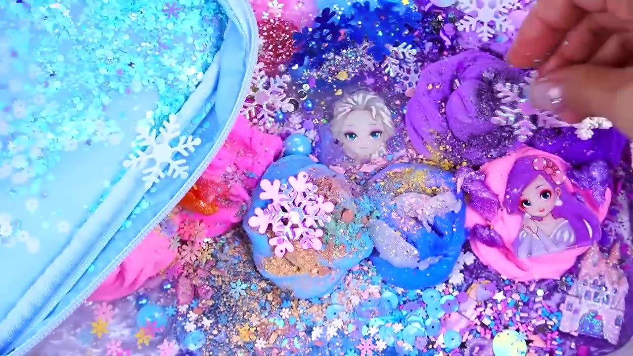 Frozen galaxy slime mixing random cute,shiny things into slime #satisfying #asmr