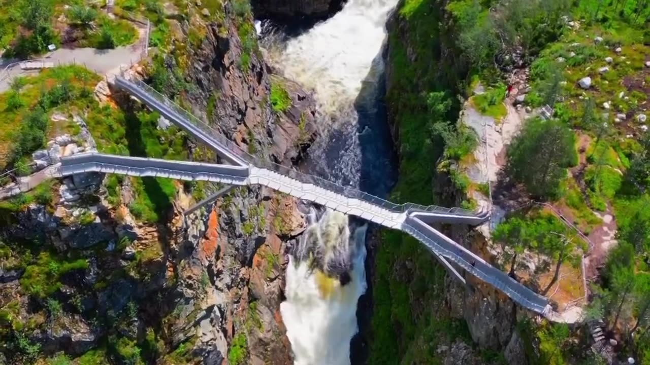 Spectacular climb to Vøringsfossen waterfall, Norway.