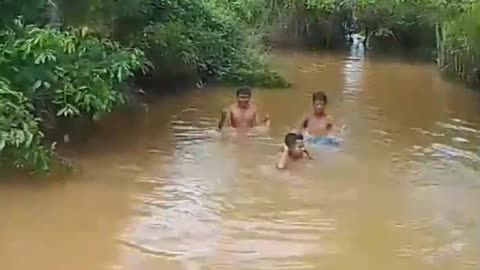 boys at the river