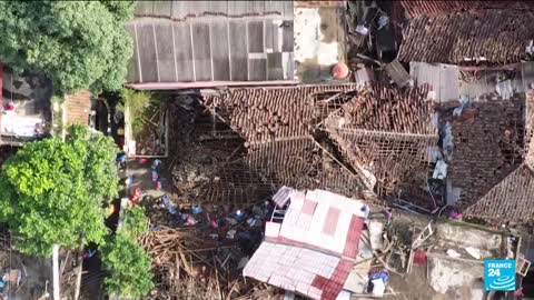 Miracle' rescue of child trapped by Indonesia quake