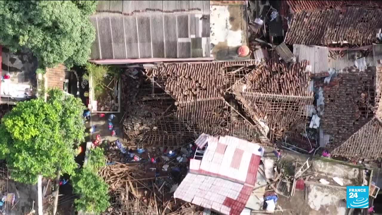 Miracle' rescue of child trapped by Indonesia quake