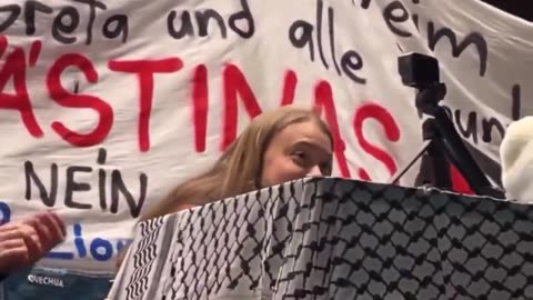 Climate change activist turned anti-Israel activist Greta Thunberg laughs as she