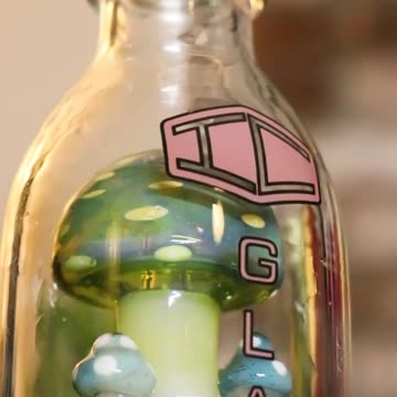 Embrace nature’s whimsy with this mushroom-shaped bubbler hand pipe