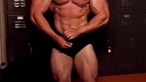 Jacob Robich bodybuilder flexing muscle