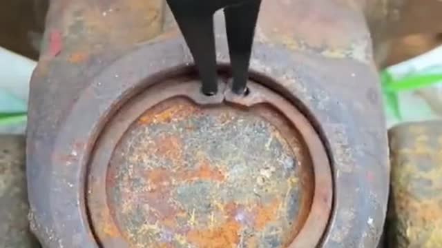 Spring disassembly retaining ring