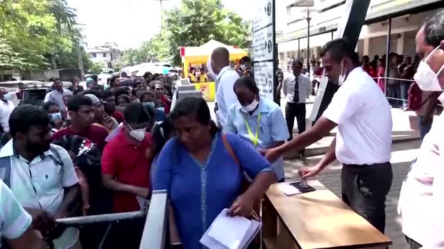 Sri Lanka swears in new president amid economic crisis