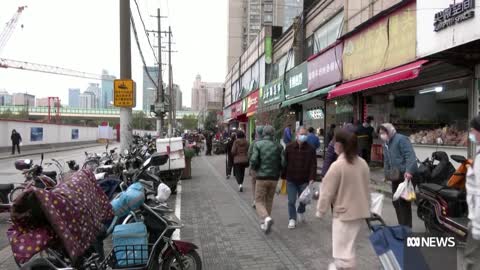 Chinese officials urge elderly to get vaccinated against Covid-19