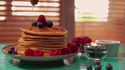 Plate with a tower of hot cakes for breakfast