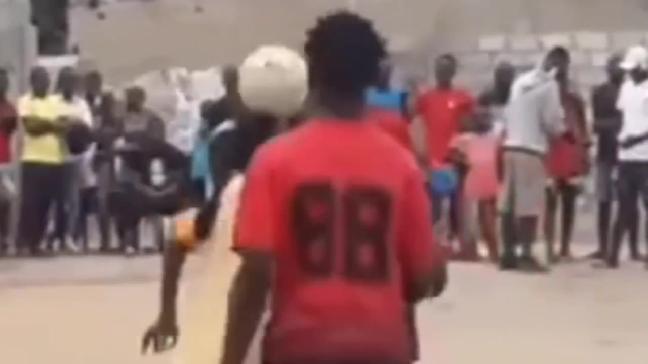 Who can dribble like these village soccer players?