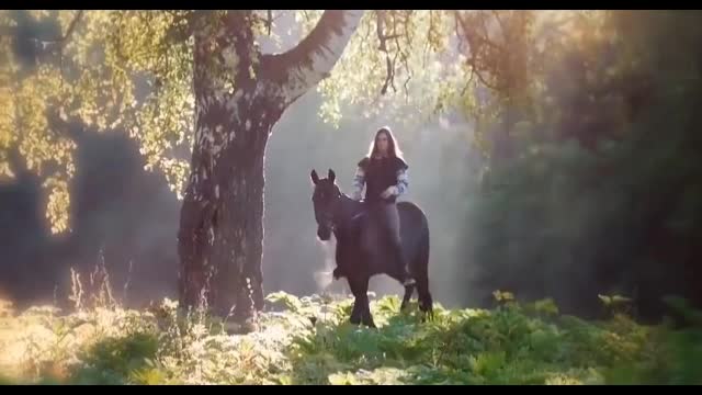 A beautiful woman looks great on a horse