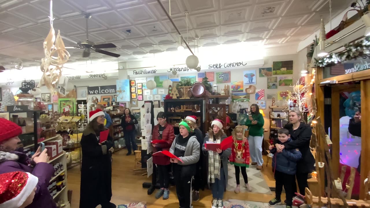 12\13\24 NW NC Burnsville Merry Main Street Christmas celebration -Carolers at Mountain Time on Main