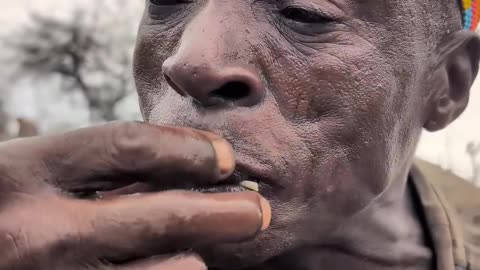 Sweet taste,,,🤤it's breakfast Meal Chief hadza enjoying their Favorite food#culture #bushmen