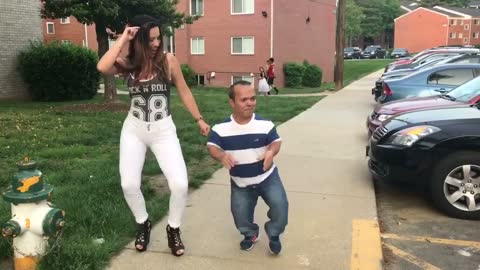 Street dancing with sexy latina