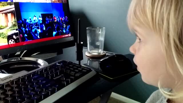 Toddler carries adorable one-sided conversation with 'Cortana'