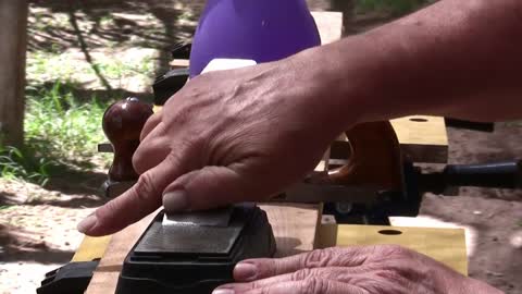 Sharpening the blade on a carpentry hand plane