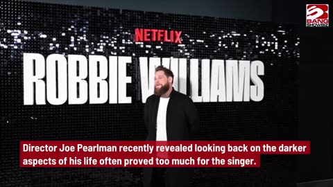 Robbie Williams Opens Up About Rudebox: A Career Regret.