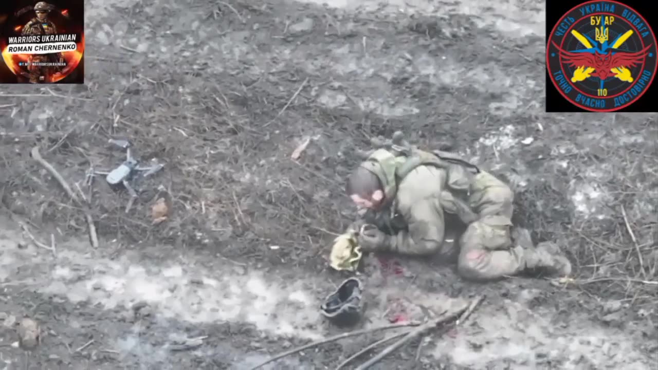 Russian soldiers spits blood after getting hit by a granade drop from a drone.