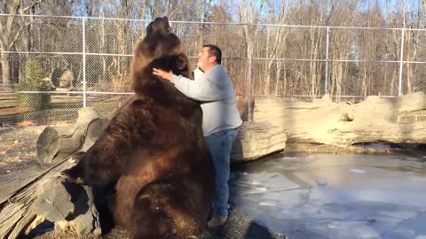 Jim playing with Jimbo the bear.