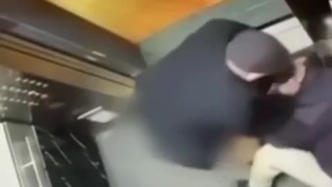 dude starts shit in the elevator and gets his head pounded against the wall.