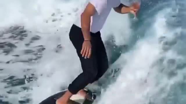 Two man enjoying and cheers while surfing😍